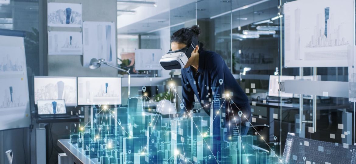 Futuristic design of office buildings. Woman using VR to look at 3D table
